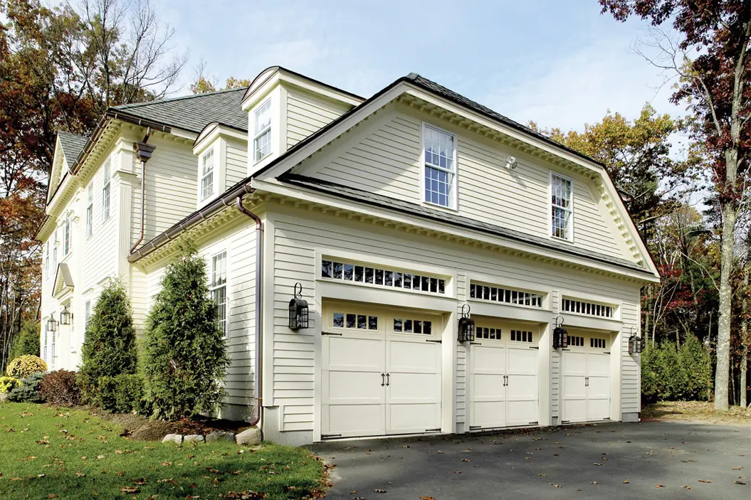 three white fiberglass garage doors